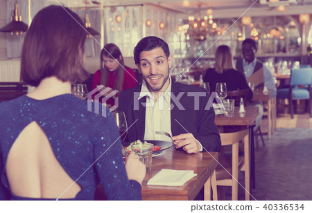 Portrait of couple who is dining and drinking wine Portrait of couple who is dining and drinking wine 40336534