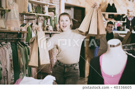Smiling female is satisfied of purchases 40336605