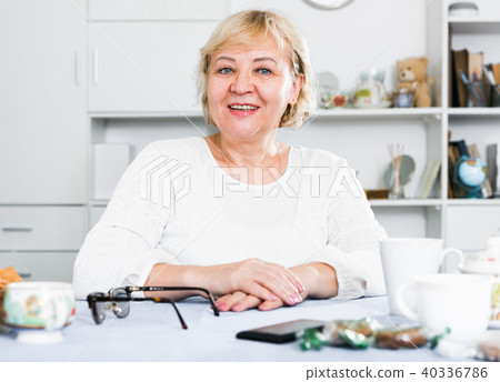 Mature woman at home 40336786
