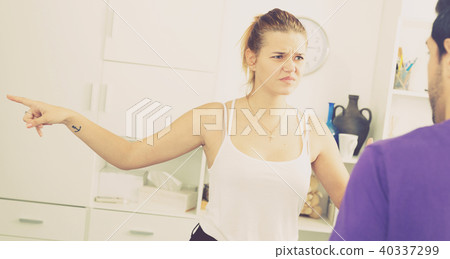 Young woman in quarrel with man 40337299