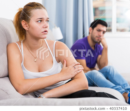 Woman on sofa after quarrel with husband Woman on sofa after quarrel with husband 40337410