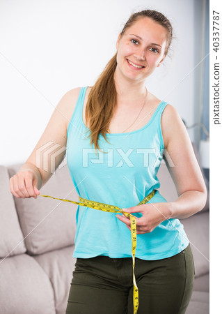 Woman happy to lose weight 40337787