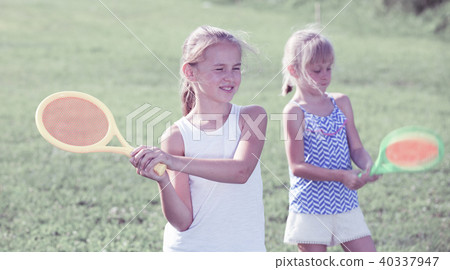 Two happy girls playing active games 40337947