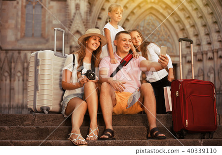 family of tourists making selfie during travelling on European family of tourists making selfie during travelling on European 40339110
