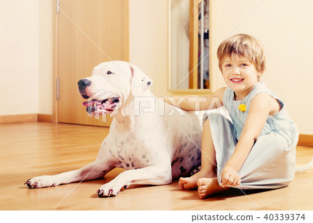 little pretty girl on the floor with dog little pretty girl on the floor with dog 40339374