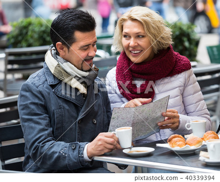 Mature couple at street cafe. 40339394