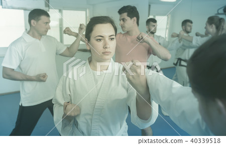 Girl in a taekwondo training in a gym 40339518