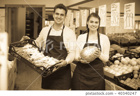 Sellers at vegetables market. Sellers at vegetables market. 40340247