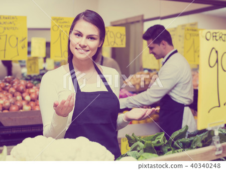 shop people standing near cabbage in grocery shop people standing near cabbage in grocery 40340248