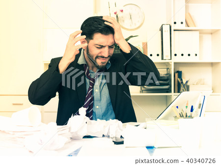 Spanish male worker is having complicated issue with project 40340726