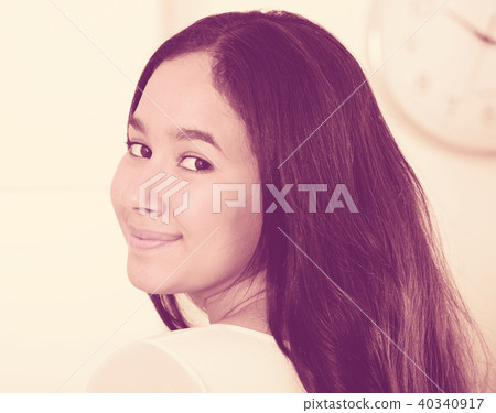 Young female with brown hair Young female with brown hair 40340917
