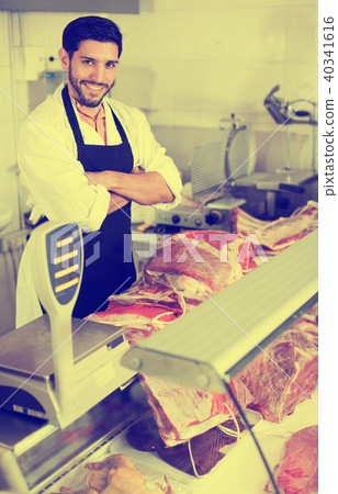 Portrait of butcher who is sellering meat 40341616