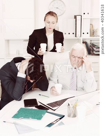 Old man is having complicated issue with reports made by subordinates 40341618