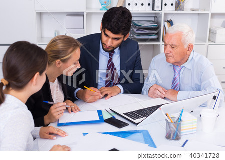 Employees are writing financial reports 40341728