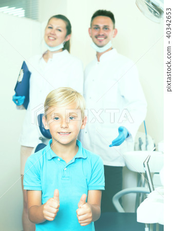 Smiling boy is satisfied Smiling boy is satisfied 40342653
