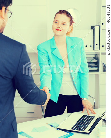 Businesswoman meetings male colleague Businesswoman meetings male colleague 40343231