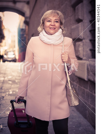 portrait of mature female with baggage 40344541