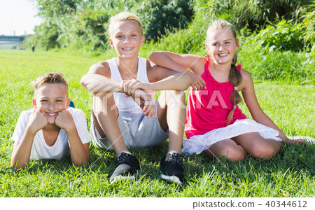 Children funning at grass Children funning at grass 40344612