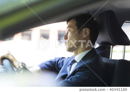 Businessman riding a car 40345189