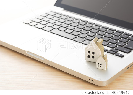 Miniature house and computer Miniature house and computer 40349642