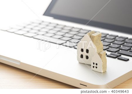 Miniature house and computer Miniature house and computer 40349643