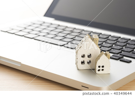 Miniature house and computer Miniature house and computer 40349644
