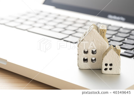 Miniature house and computer Miniature house and computer 40349645
