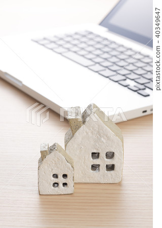 Miniature house and computer Miniature house and computer 40349647