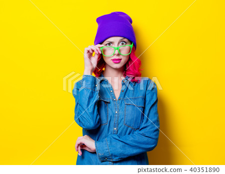 girl in blue shirt, purple hat and green glasses 40351890