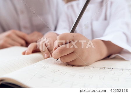 Close up. Child learns spelling. Close up. Child learns spelling. 40352158