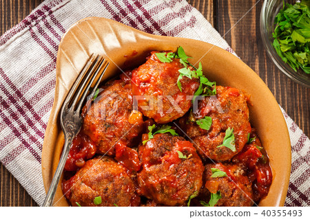 Pork meatballs with spicy tomato sauce in dish Pork meatballs with spicy tomato sauce in dish 40355493