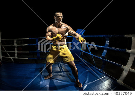 Thai boxer on boxing ring Thai boxer on boxing ring 40357049