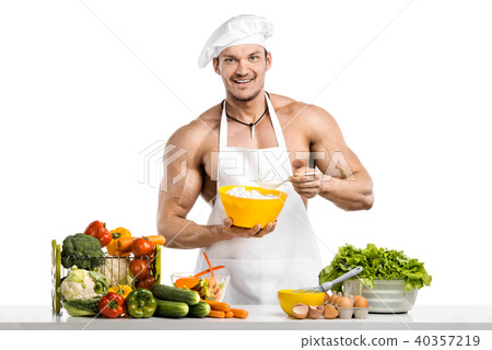 Man bodybuilder in white toque blanche Man bodybuilder in white toque blanche 40357219