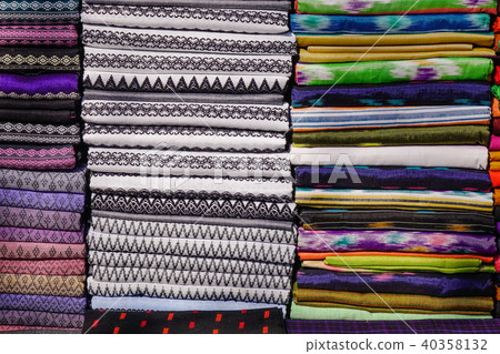 Colorful textile for sale at a street market Colorful textile for sale at a street market 40358132