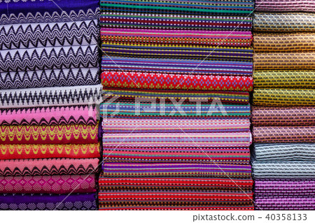 Colorful textile for sale at a street market Colorful textile for sale at a street market 40358133