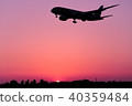 Sunset and airplane silhouette 40359484