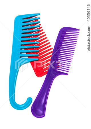 three plastic combs three plastic combs 40359546