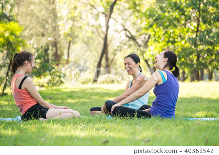 Activity, mother and daughter relaxing in the park 40361542