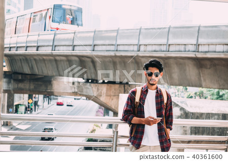 Portrait of young asian man in casual clothes Portrait of young asian man in casual clothes 40361600