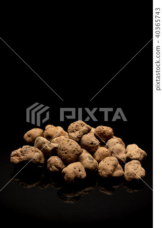 Lightweight expanded clay aggregate on black 40365743