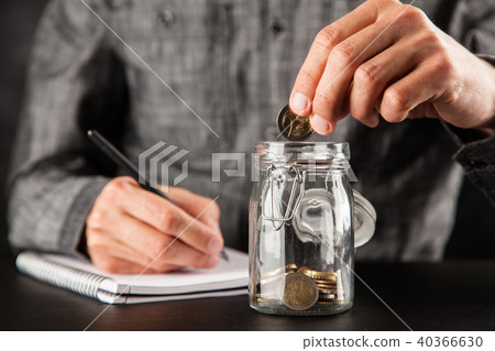 Jar of coins Jar of coins 40366630