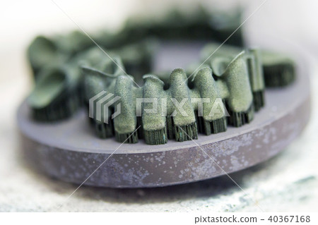 Object printed on metal 3d printer after heat treatment synterization. 40367168