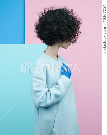 Fashion portrait of beautiful asian woman in coat Fashion portrait of beautiful asian woman in coat 40367254