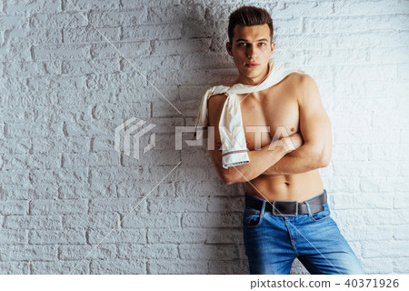 young male bodybuilder posing. Good physical preparation young male bodybuilder posing. Good physical preparation 40371926