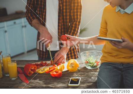 Little boy helping his dad in kitchen Little boy helping his dad in kitchen 40371930