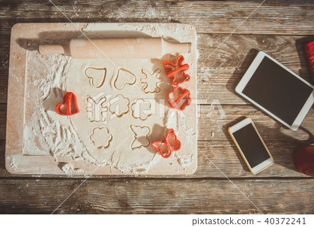 Wooden surface with pastry in process 40372241