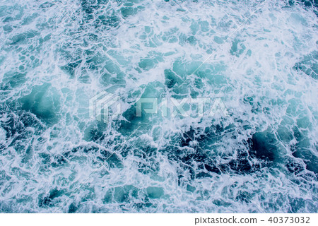 Background blue waves of the sea. Background blue waves of the sea. 40373032