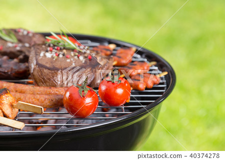 Barbecue grill with various kinds of meat 40374278