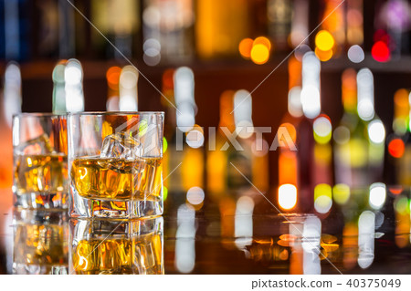 Whiskey drinks on bar counter 40375049