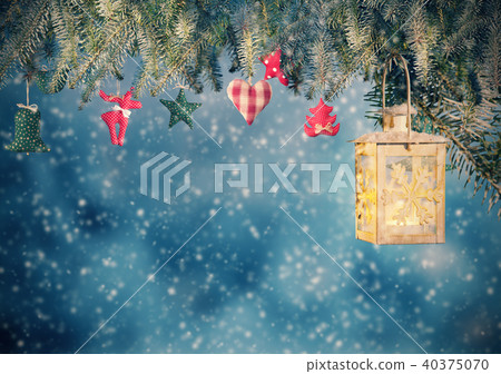 Christmas lantern hanging on fir branches Christmas lantern hanging on fir branches 40375070